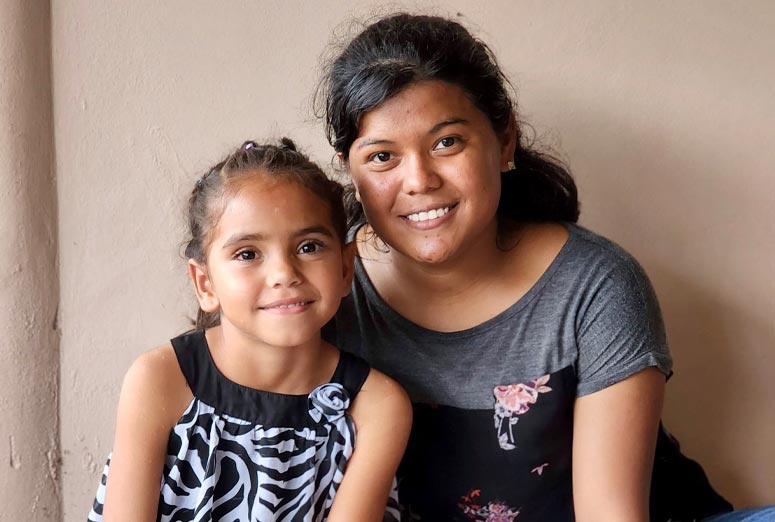 Young woman and girl posing for the camera in Honduras.